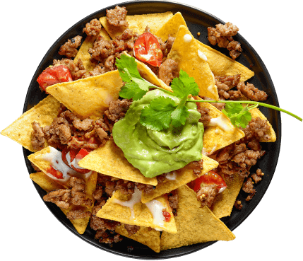 Plate of nachos with a generous serving of AvoFresh avocado on top
